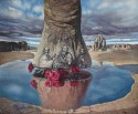 The leg of the elephant that is reflected in gavel